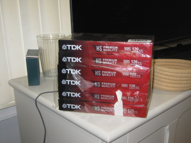 Stack of VHS tapes ready to be digitized